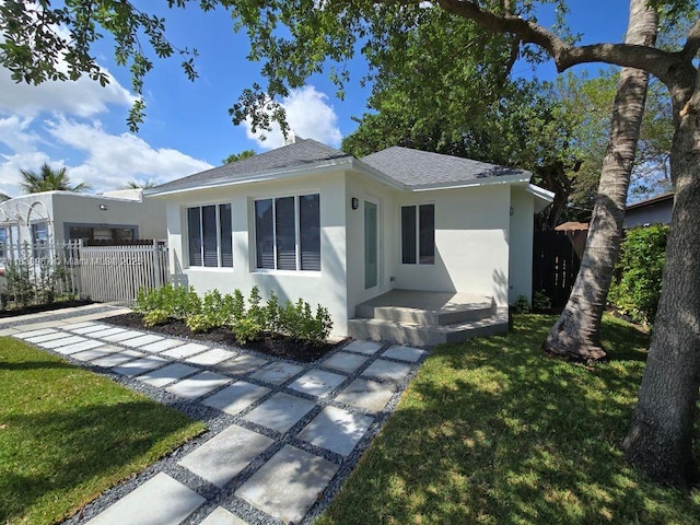 1923 NW 48th St, Miami, FL 33142 - view of front of home featuring stucco siding and a shingled roof