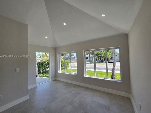 1923 NW 48th St, Miami, FL 33142 - unfurnished room featuring high vaulted ceiling and recessed lighting
