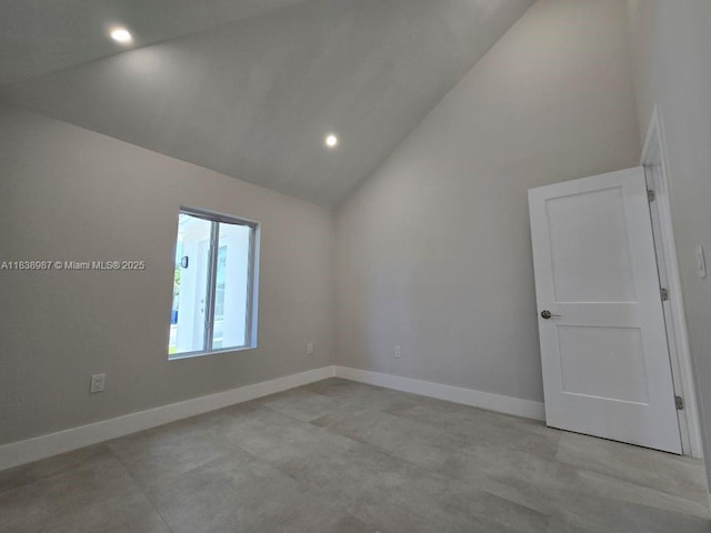 1923 NW 48th St, Miami, FL 33142 - spare room featuring high vaulted ceiling, recessed lighting, and concrete flooring