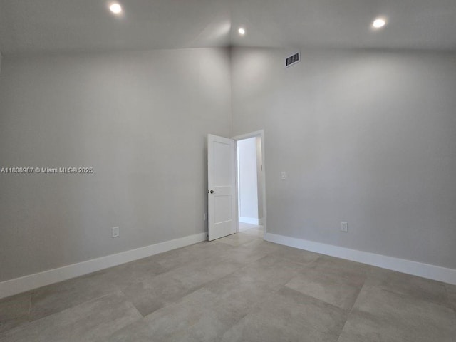 1923 NW 48th St, Miami, FL 33142 - unfurnished room featuring recessed lighting and high vaulted ceiling