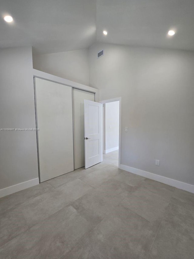 1923 NW 48th St, Miami, FL 33142 - unfurnished bedroom featuring recessed lighting, a closet, and high vaulted ceiling
