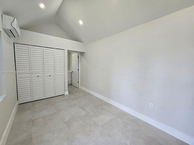 1923 NW 48th St, Miami, FL 33142 - unfurnished bedroom featuring an AC wall unit, lofted ceiling, concrete floors, recessed lighting, and a closet