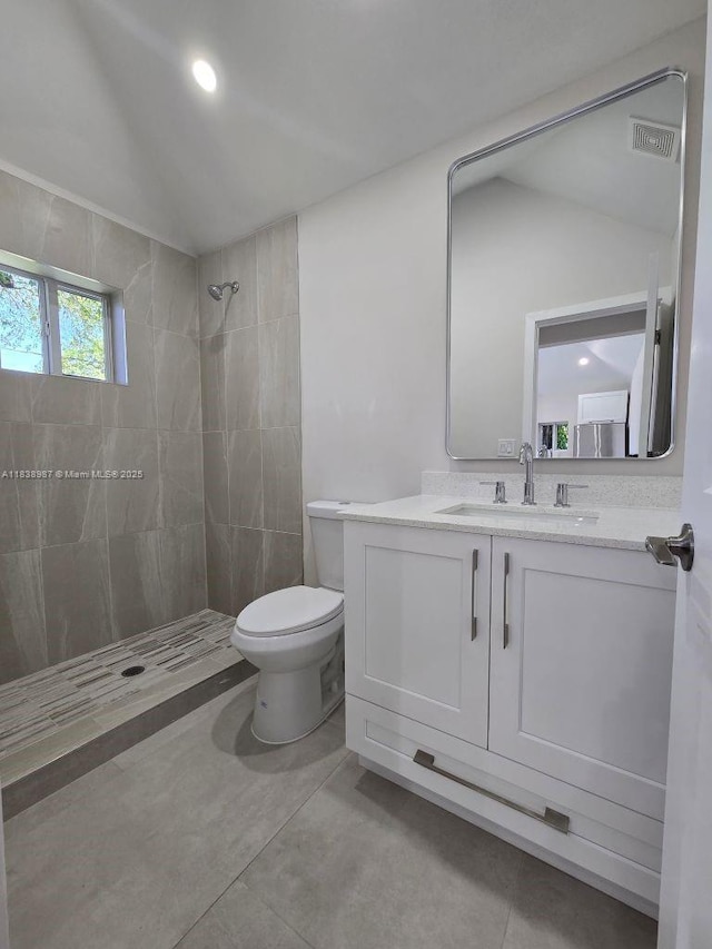 1923 NW 48th St, Miami, FL 33142 - bathroom with lofted ceiling, tiled shower, vanity, and concrete floors