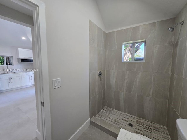 1923 NW 48th St, Miami, FL 33142 - bathroom featuring tiled shower, vaulted ceiling, vanity, and recessed lighting