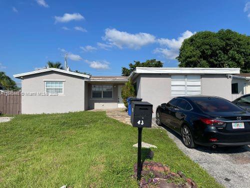 433 SW 28th Ave, Fort Lauderdale, FL 33312 - single story home with stucco siding