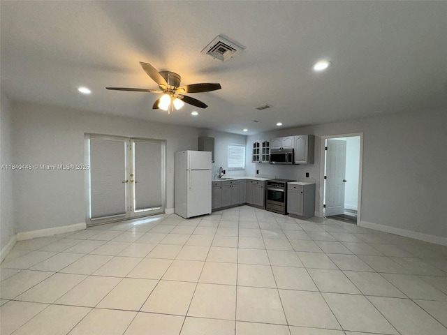 433 SW 28th Ave, Fort Lauderdale, FL 33312 - kitchen featuring appliances with stainless steel finishes, gray cabinetry, ceiling fan, recessed lighting, and light countertops