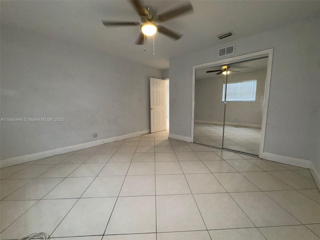 433 SW 28th Ave, Fort Lauderdale, FL 33312 - unfurnished bedroom featuring a ceiling fan, light tile patterned floors, and a closet