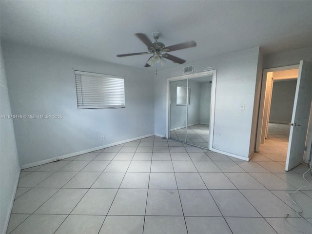 433 SW 28th Ave, Fort Lauderdale, FL 33312 - unfurnished bedroom with light tile patterned flooring, a closet, and ceiling fan