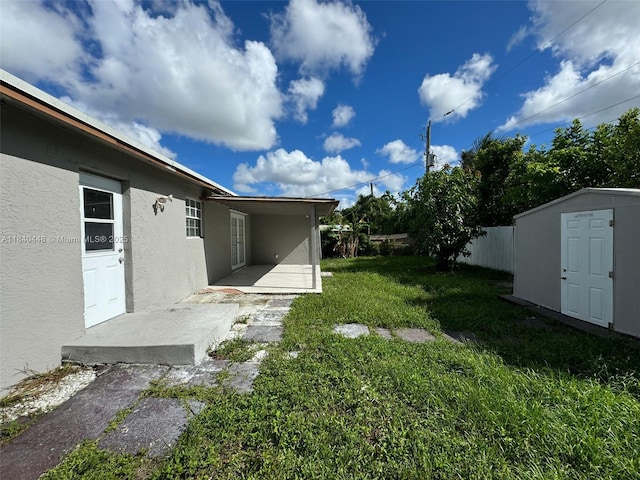 433 SW 28th Ave, Fort Lauderdale, FL 33312 - view of yard with a shed and a patio