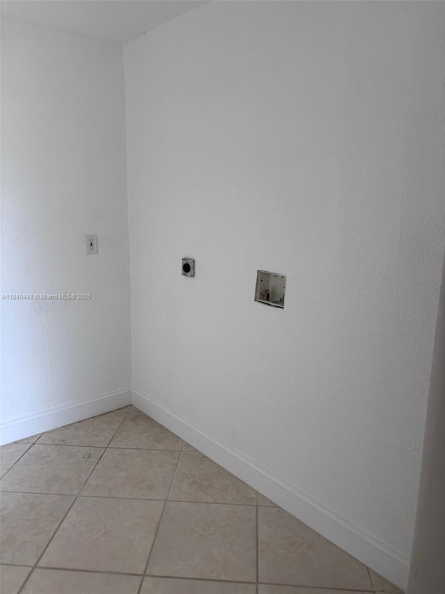 433 SW 28th Ave, Fort Lauderdale, FL 33312 - laundry room with electric dryer hookup, washer hookup, and light tile patterned floors