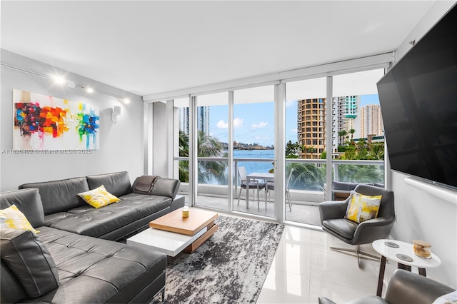 465 Brickell Ave Unit 417, Miami, FL 33131 - living area with a wall of windows and tile patterned flooring
