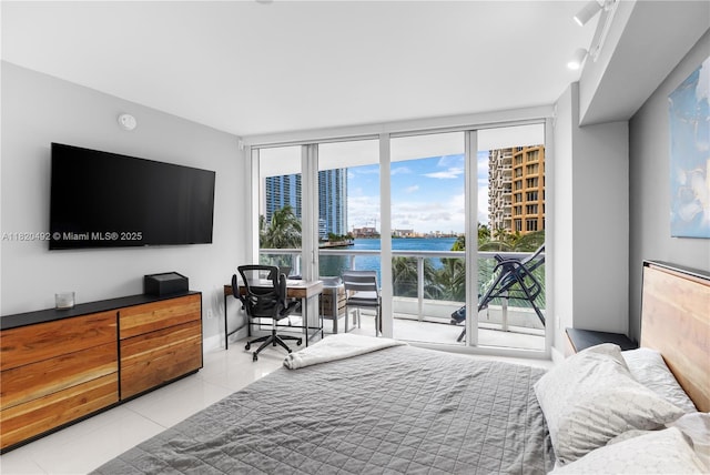 465 Brickell Ave Unit 417, Miami, FL 33131 - tiled bedroom with a wall of windows and access to outside