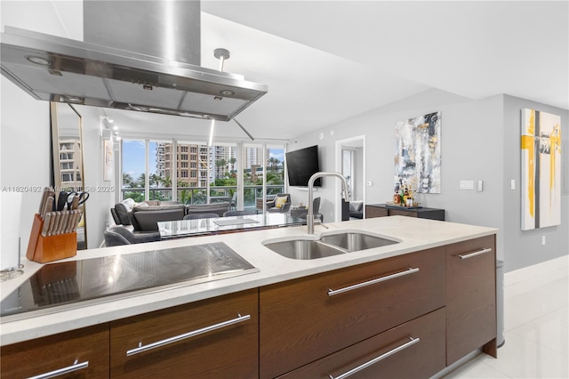 465 Brickell Ave Unit 417, Miami, FL 33131 - kitchen with wall chimney range hood, open floor plan, and modern cabinets