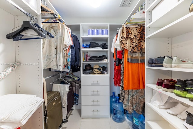465 Brickell Ave Unit 417, Miami, FL 33131 - walk in closet with tile patterned floors
