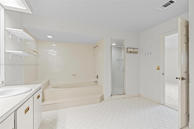 7767 NW 187th Ter, Miami, FL 33015 - bathroom with tile patterned flooring, vanity, a tub to relax in, a shower, and recessed lighting