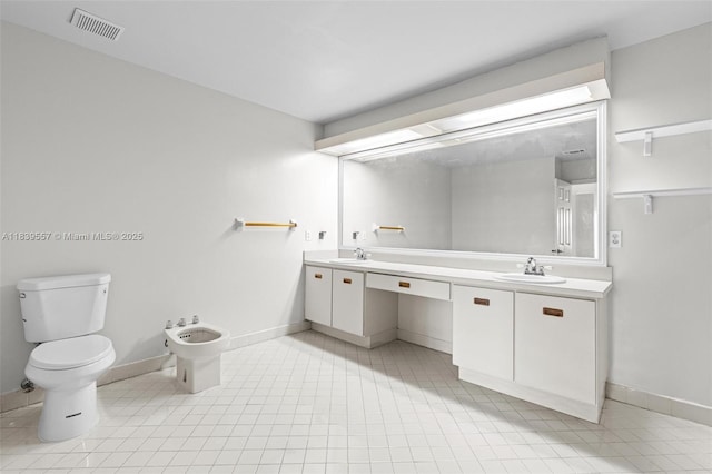 7767 NW 187th Ter, Miami, FL 33015 - full bath with double vanity, a bidet, and tile patterned floors