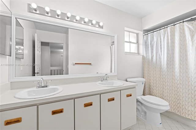 7767 NW 187th Ter, Miami, FL 33015 - bathroom with double vanity and tile patterned flooring