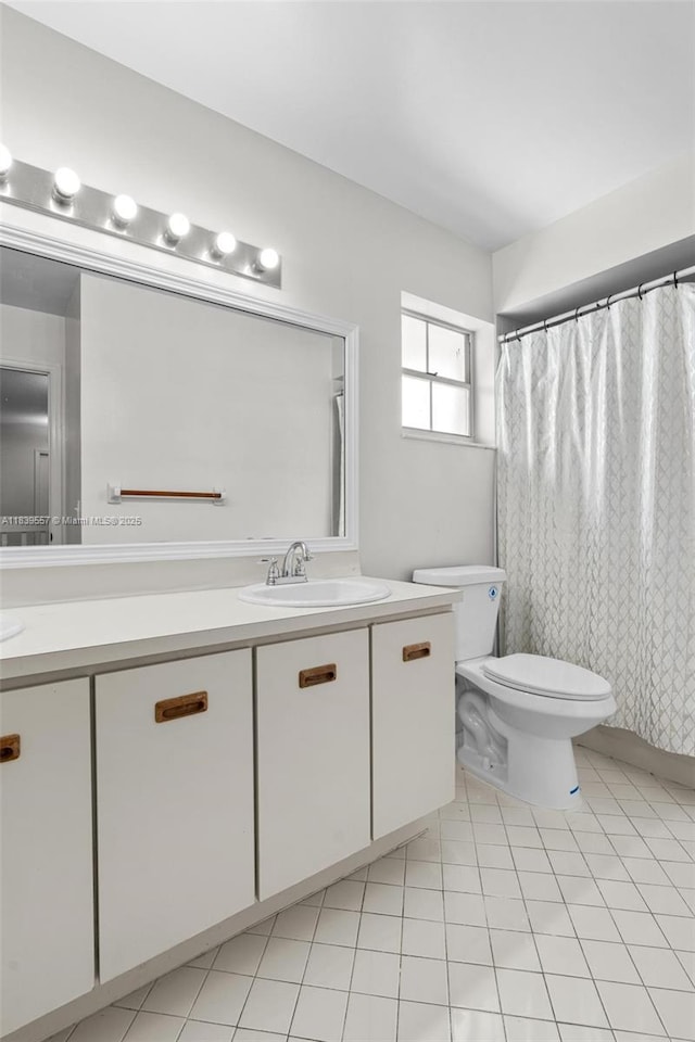 7767 NW 187th Ter, Miami, FL 33015 - bathroom with vanity and tile patterned flooring