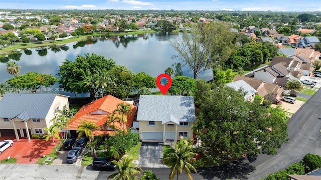 7767 NW 187th Ter, Miami, FL 33015 - aerial perspective of suburban area featuring a nearby body of water