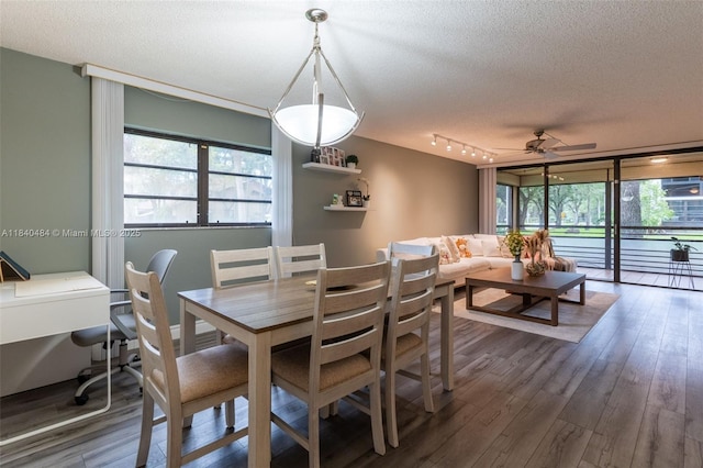 7625 NW 79th Ave Unit 101, Tamarac, FL 33321 - dining space with a ceiling fan, a textured ceiling, and wood finished floors