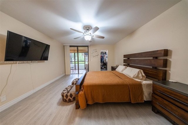 7625 NW 79th Ave Unit 101, Tamarac, FL 33321 - bedroom featuring wood finished floors, access to outside, and ceiling fan