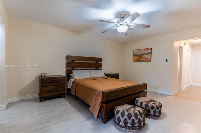 7625 NW 79th Ave Unit 101, Tamarac, FL 33321 - bedroom with light wood-style floors and a ceiling fan