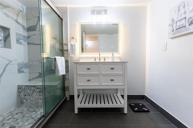 7625 NW 79th Ave Unit 101, Tamarac, FL 33321 - bathroom with a marble finish shower, vanity, and tile patterned floors