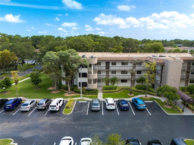 7625 NW 79th Ave Unit 101, Tamarac, FL 33321 - view of property with uncovered parking