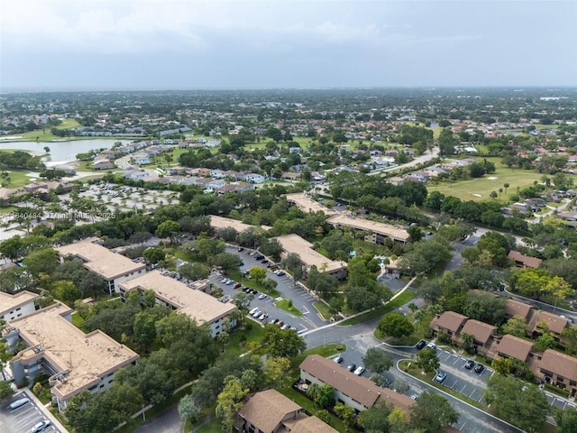 7625 NW 79th Ave Unit 101, Tamarac, FL 33321 - aerial overview of property's location featuring a nearby body of water and nearby suburban area