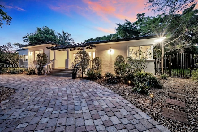 5701 SW 33rd St, Miami, FL 33155 - view of front of house with a pergola and stucco siding