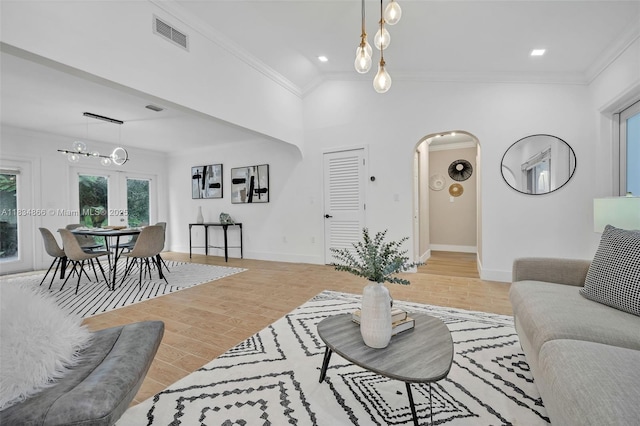 5701 SW 33rd St, Miami, FL 33155 - living area featuring arched walkways, crown molding, lofted ceiling, and recessed lighting