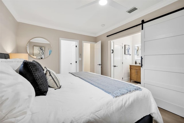 5701 SW 33rd St, Miami, FL 33155 - bedroom with ensuite bath, wood finished floors, and a ceiling fan