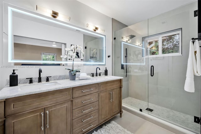 5701 SW 33rd St, Miami, FL 33155 - bathroom featuring healthy amount of natural light, a shower stall, double vanity, and tile patterned floors