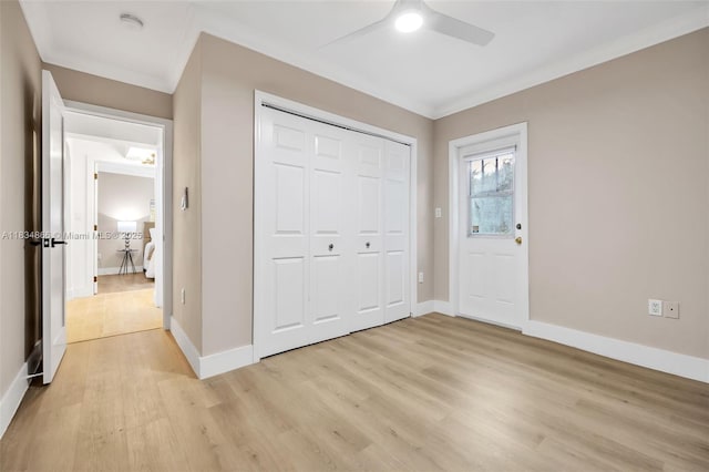 5701 SW 33rd St, Miami, FL 33155 - unfurnished bedroom with light wood finished floors, crown molding, a closet, and a ceiling fan