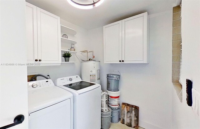 5701 SW 33rd St, Miami, FL 33155 - laundry area with cabinet space, separate washer and dryer, and electric water heater