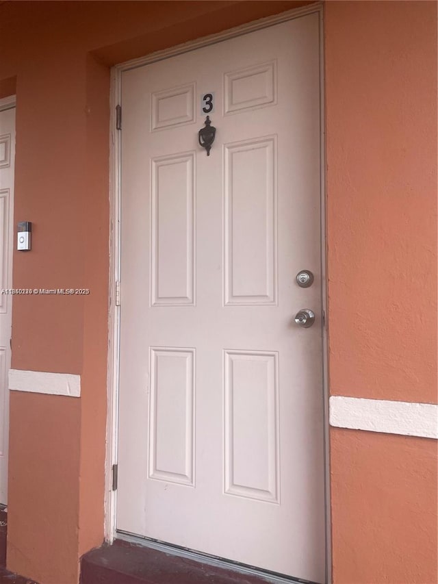3401 SW 11th St Unit 1B, Miami, FL 33135 - property entrance featuring stucco siding