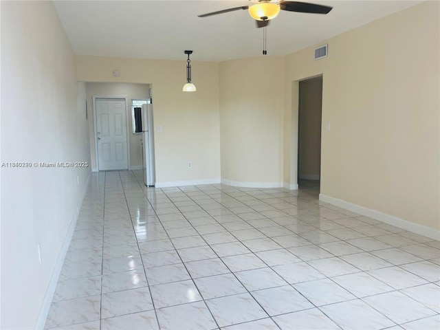 3401 SW 11th St Unit 1B, Miami, FL 33135 - spare room with ceiling fan and baseboards
