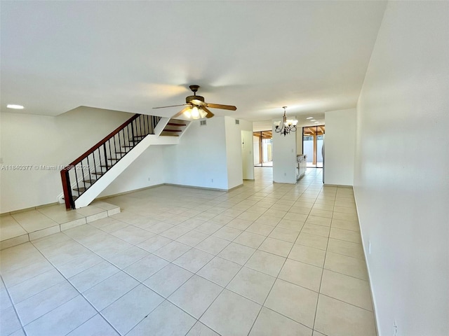 1725 SW 131st Place Cir S, Miami, FL 33175 - unfurnished living room featuring light tile patterned floors, a chandelier, ceiling fan, and stairway