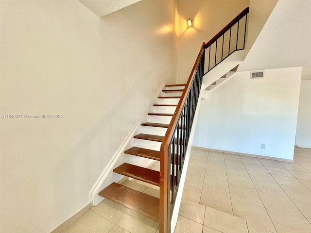 1725 SW 131st Place Cir S, Miami, FL 33175 - staircase featuring tile patterned flooring and baseboards