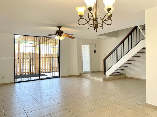 1725 SW 131st Place Cir S, Miami, FL 33175 - foyer with light tile patterned flooring, a chandelier, a ceiling fan, and stairway