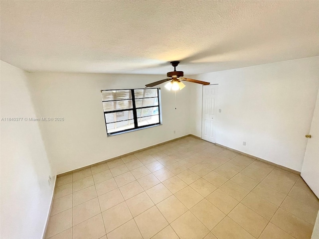 1725 SW 131st Place Cir S, Miami, FL 33175 - empty room with ceiling fan, light tile patterned floors, and a textured ceiling