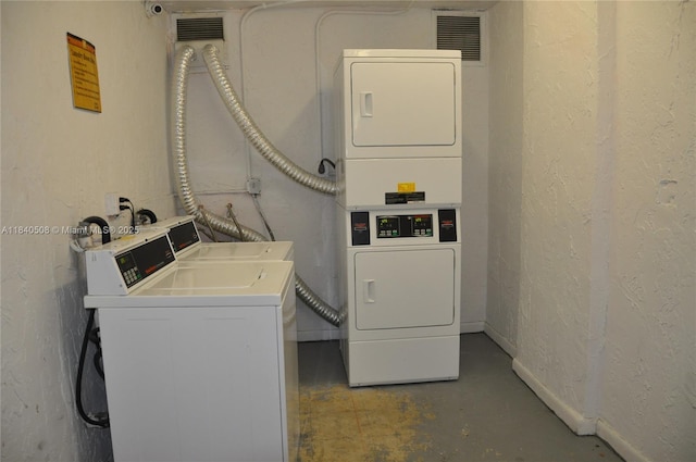 13499 Biscayne Blvd Unit 1011, North Miami, FL 33181 - community laundry with stacked washing machine and dryer, independent washer and dryer, and a textured wall