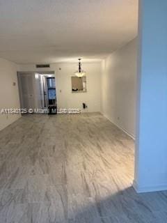 4760 W Lucerne Lakes Blvd W Unit 108, Lake Worth, FL 33467 - unfurnished living room featuring wood finished floors