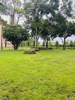 4760 W Lucerne Lakes Blvd W Unit 108, Lake Worth, FL 33467 - view of green lawn