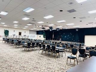 4760 W Lucerne Lakes Blvd W Unit 108, Lake Worth, FL 33467 - dining area featuring a drop ceiling