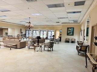 4760 W Lucerne Lakes Blvd W Unit 108, Lake Worth, FL 33467 - common area featuring a paneled ceiling
