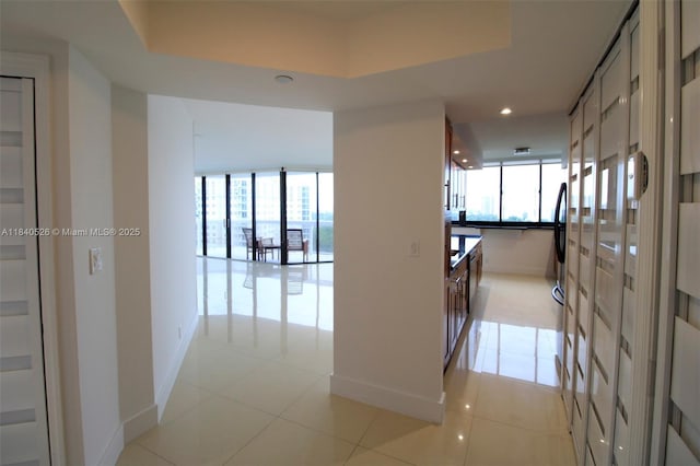 20185 E Country Club Dr Unit 1105, Aventura, FL 33180 - corridor with recessed lighting, healthy amount of natural light, and light tile patterned floors