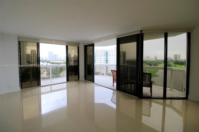 20185 E Country Club Dr Unit 1105, Aventura, FL 33180 - tiled spare room with a city view and expansive windows
