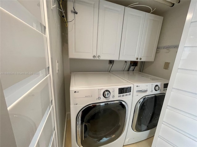 20185 E Country Club Dr Unit 1105, Aventura, FL 33180 - laundry room featuring cabinet space and independent washer and dryer