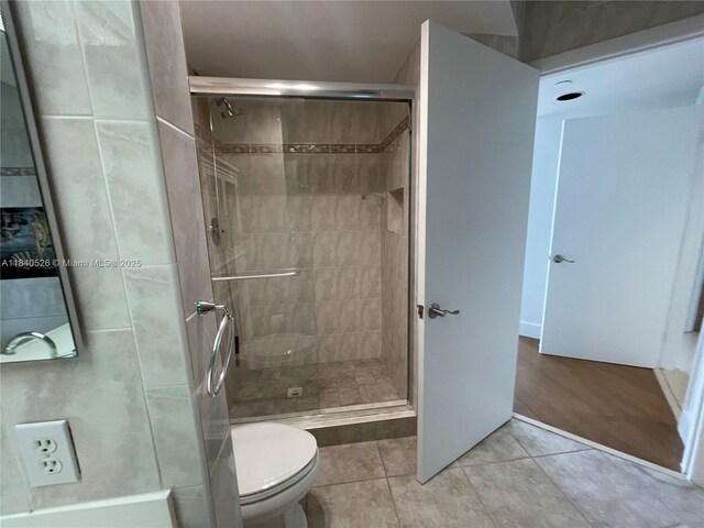 20185 E Country Club Dr Unit 1105, Aventura, FL 33180 - bathroom with tile patterned flooring and a stall shower